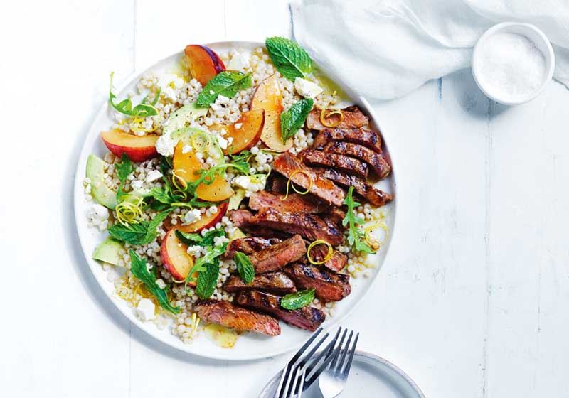 Spiced Porterhouse Steak with Plum and Couscous Salad